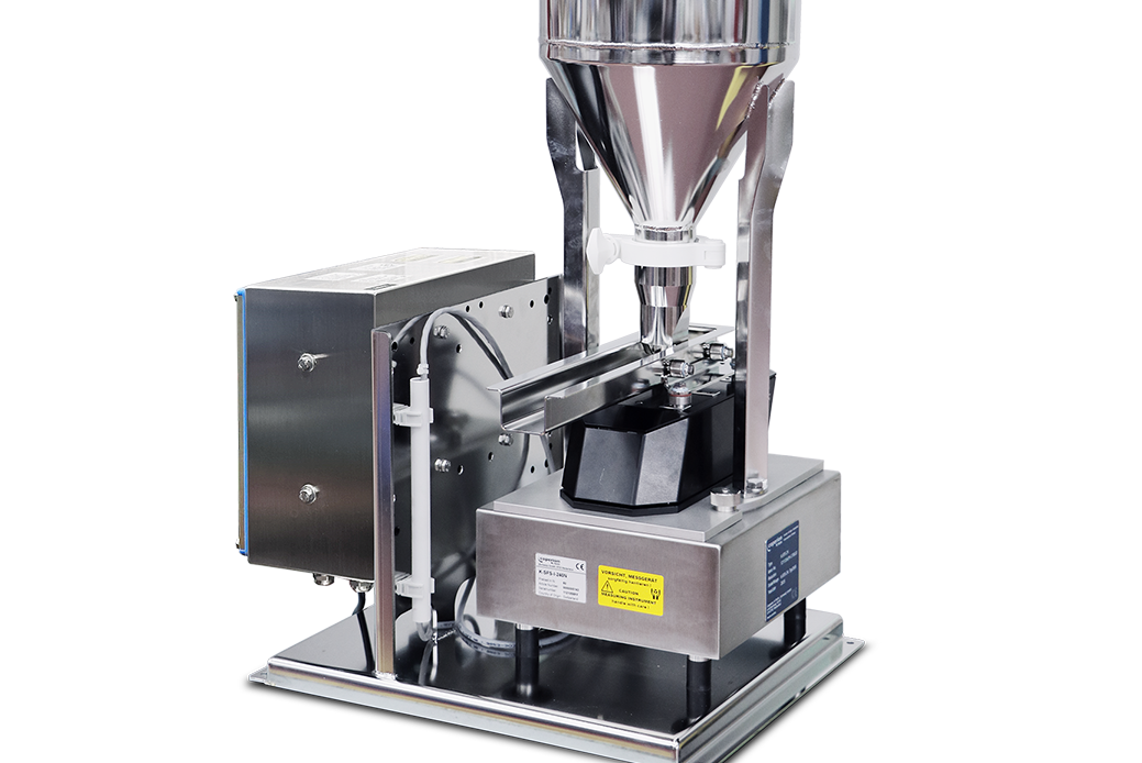 Coperion K-Tron  V100 vibratory feeder with open tray